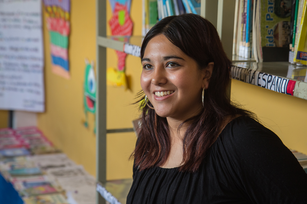 Librarian Gloria Muños Garcia shows off the many changes she’s made in her small municipal library in the town of San Miguel Morazán.